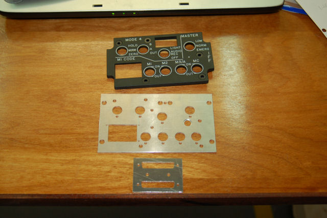 Edge-lit panel, main mounting plate and the connector mounting plate.